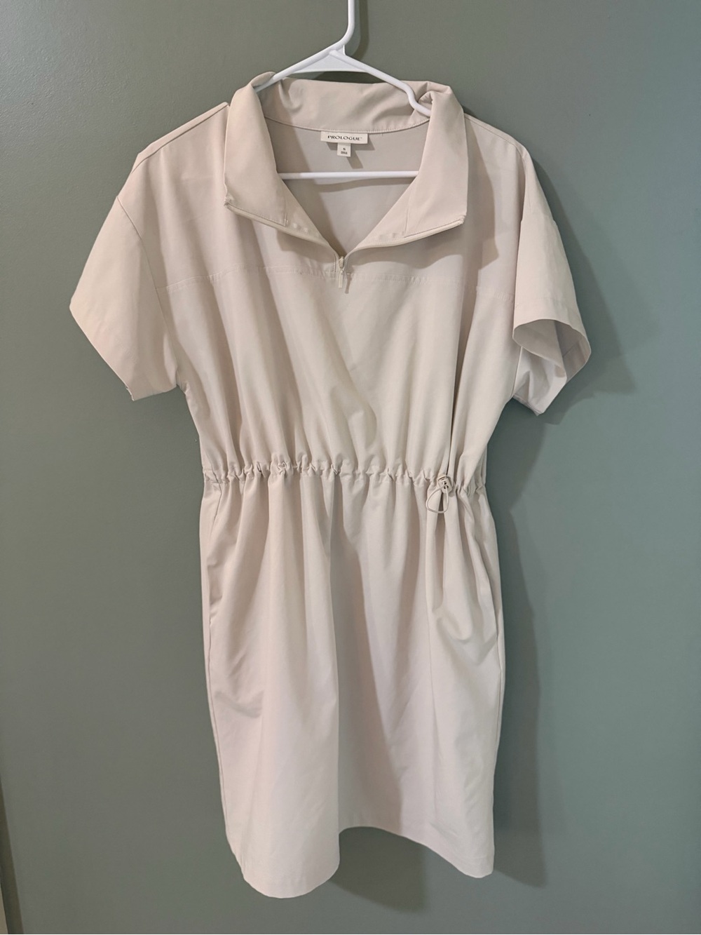 Prologue brand mini dress features a cream-colored scuba fabric small